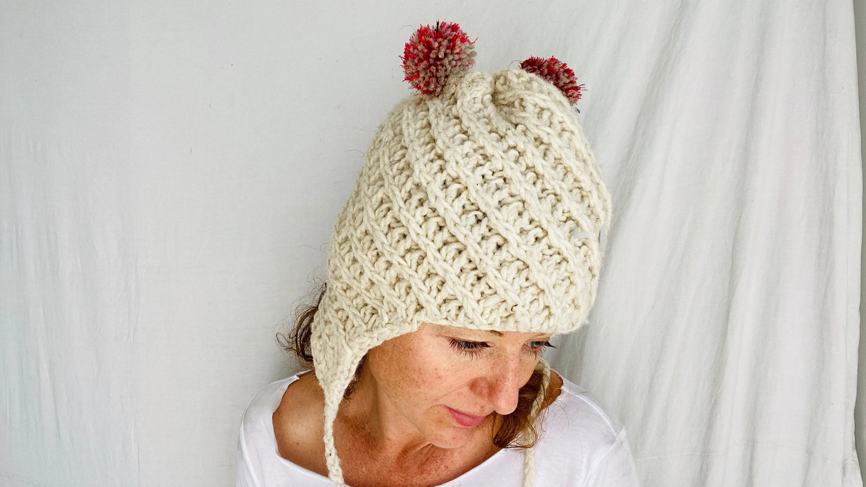 Wool Pompom Hat with Ear Flaps.