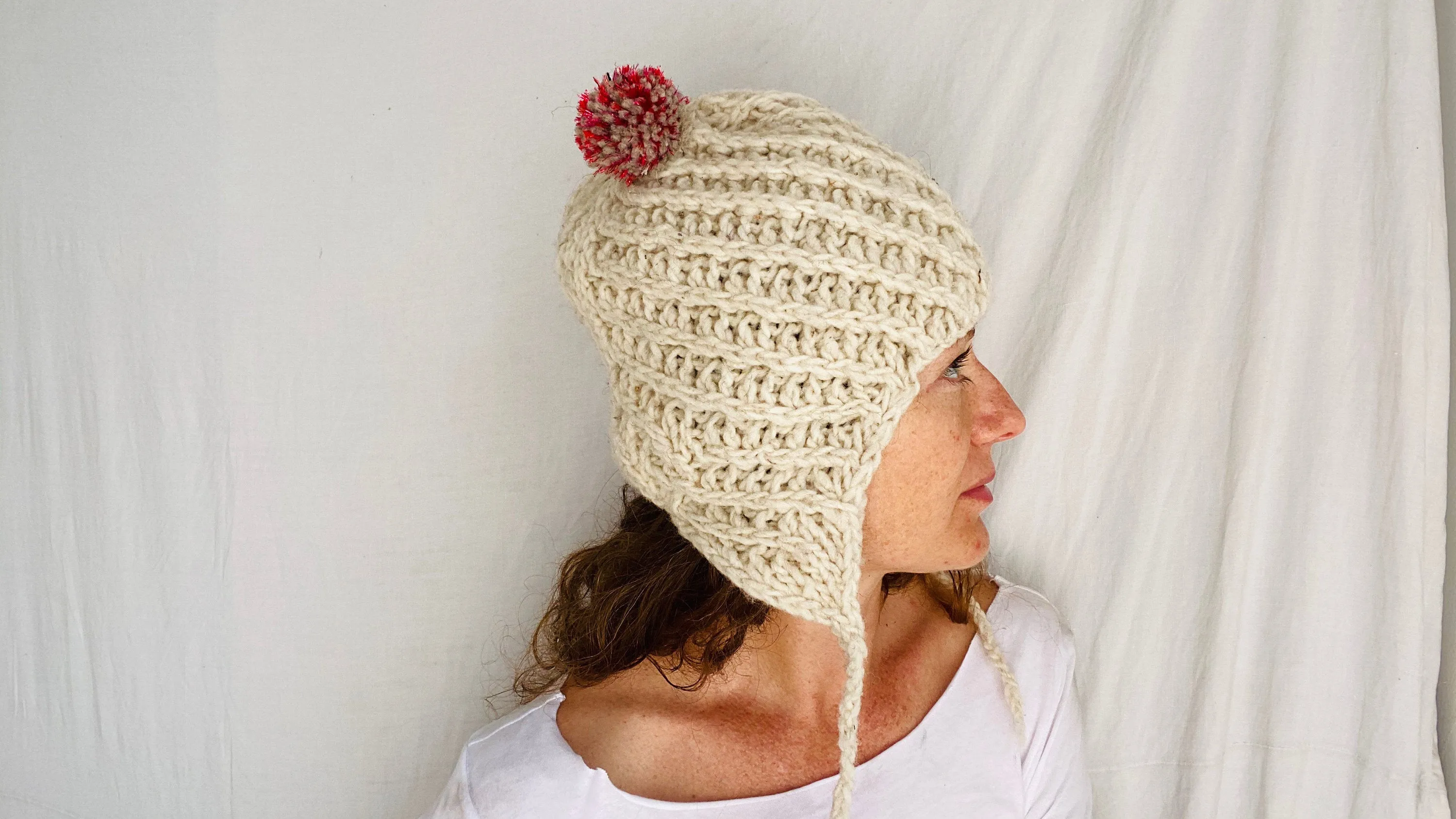 Wool Pompom Hat with Ear Flaps.